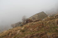 L’arrivo all’Alpe Graner ormai nella nebbia